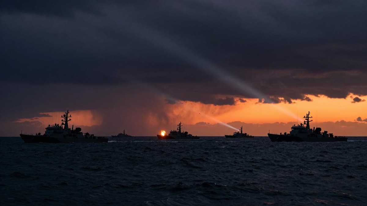 Silhouetted Iranian naval vessels under attack on the Caspian Sea with distant explosions.