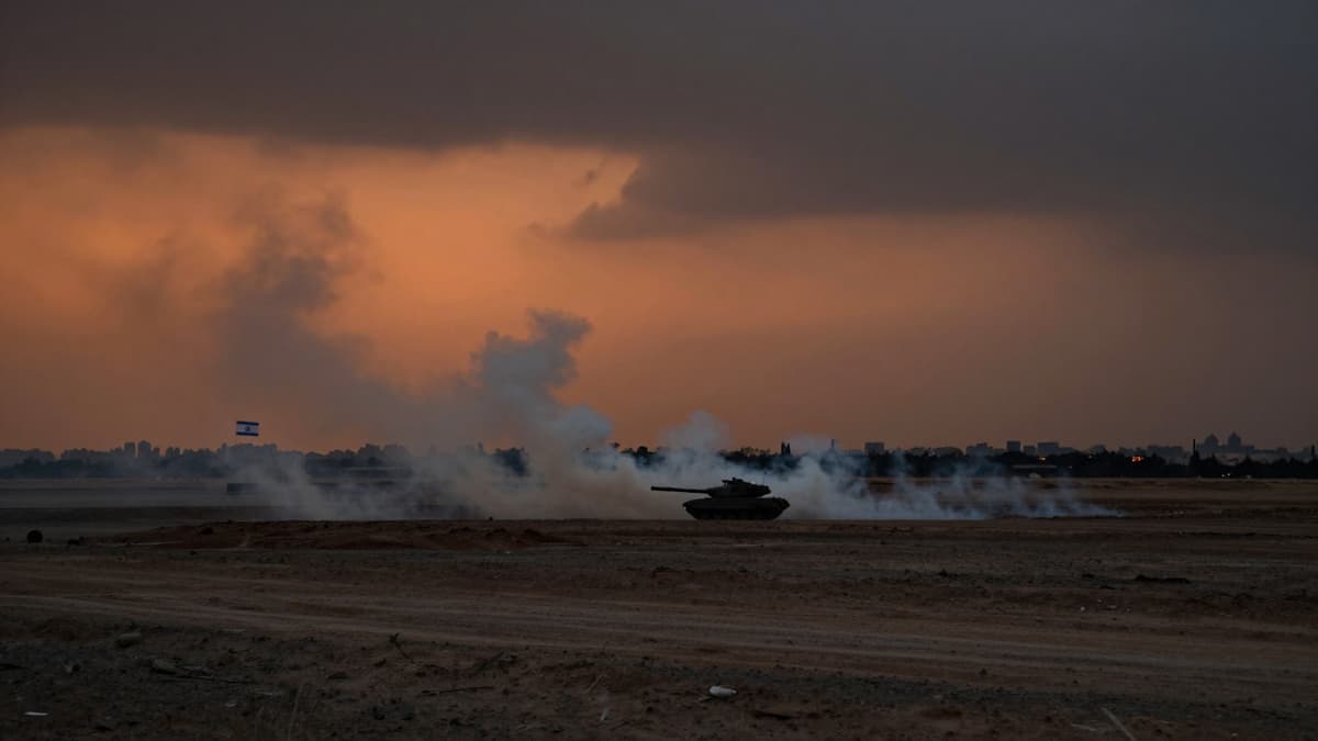 Smoke rising from a conflict zone with a darkened city skyline indicating a power outage.
