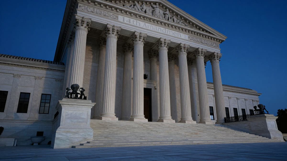 Grand granite Supreme Court building steps under dramatic twilight with a faint 14th Amendment overlay.
