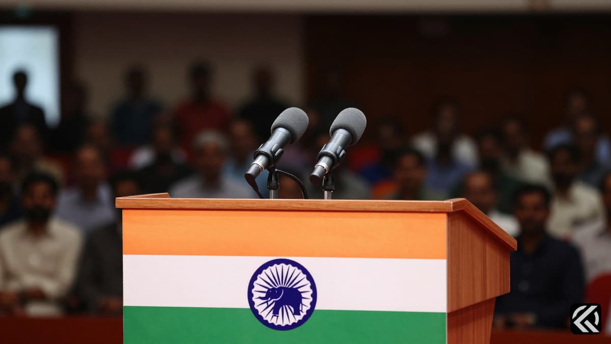 A wooden political podium with Indian flags and microphones on a stage with a blurred audience, symbolizing political debate.