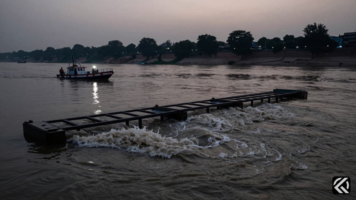 Rescue boats navigate a pontoon bridge on the Yamuna River after a boat capsizing incident.