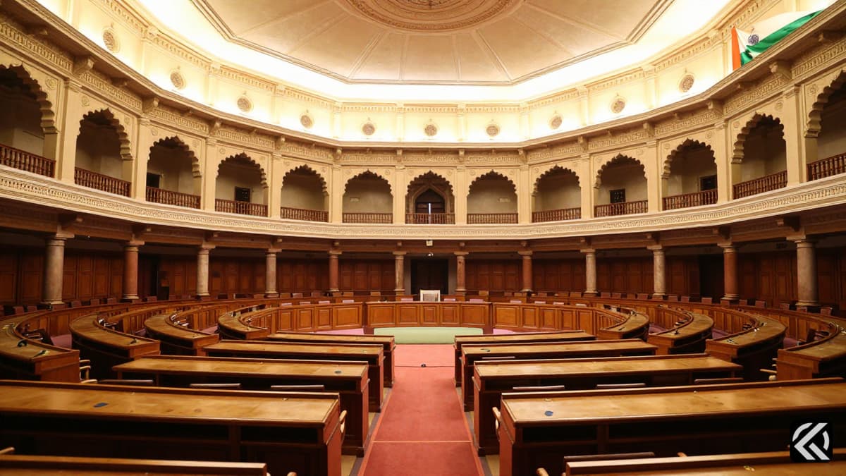 Interior view of the Indian Parliament House showing ornate architecture and the national flag.