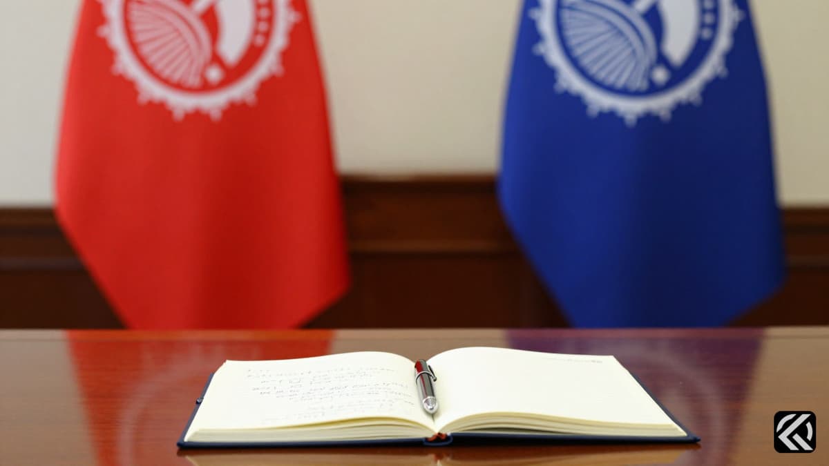 Two stacks of political party flags on a podium behind a desk with documents.