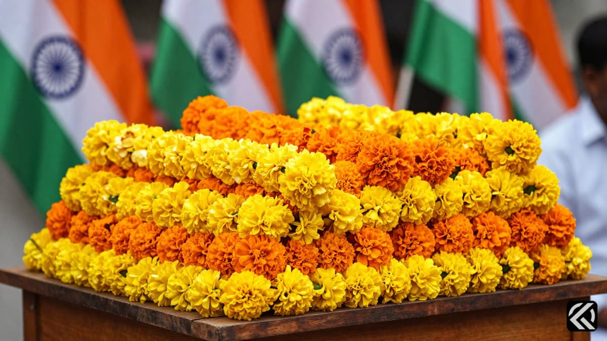 Piles of marigold garlands and blurred political flags symbolizing election alliances.