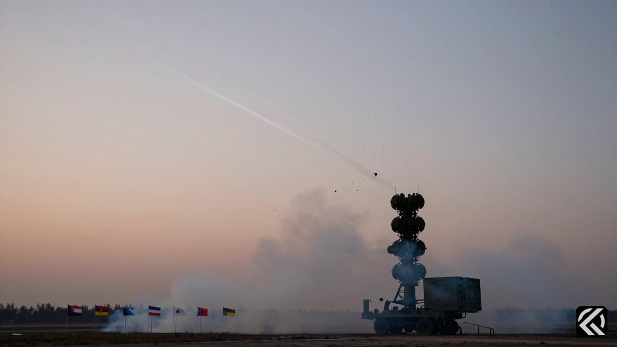 Military air defense system intercepting aerial threats over a fortified zone.