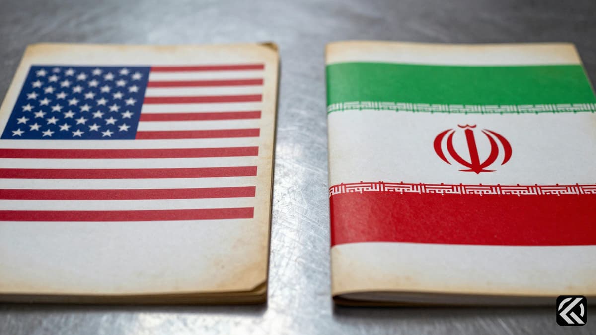 Weathered US and Iran diplomatic documents separated by space on a metal table symbolizing distant peace talks